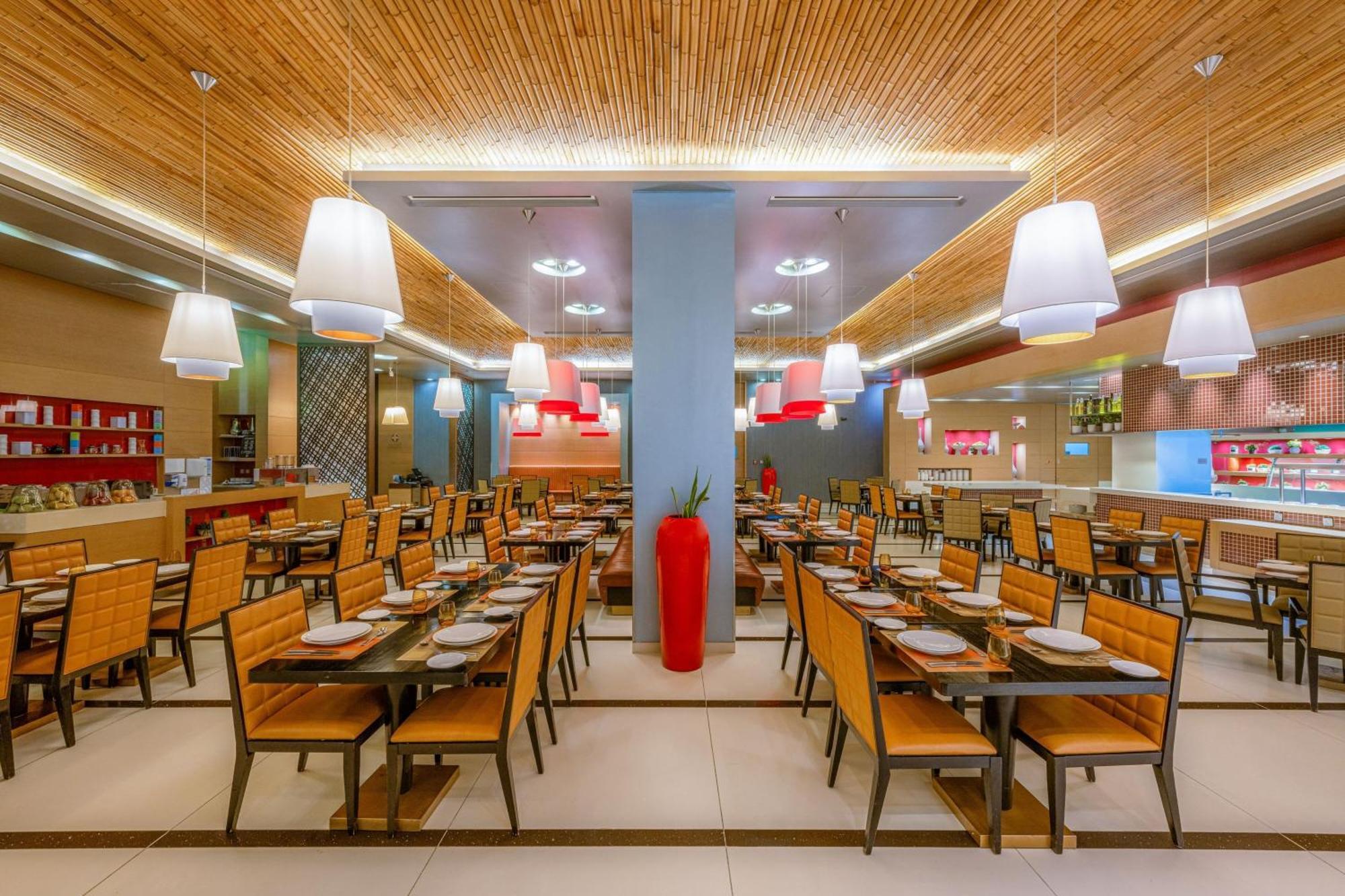 Four Points By Sheraton al-Ain Exterior foto The interior of a typical buffet restaurant